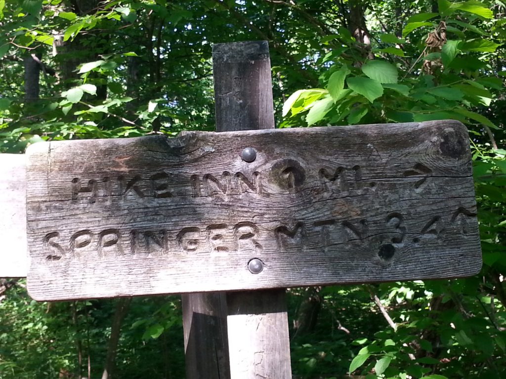 Sign to Hike Inn and Springer Mountain